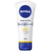 کرم دست نیوآ Q10 ضد پیری ۳ در ۱ | ضد چروک، ضد لک UV و مرطوبکننده قوی 75میل Nivea Q10 Creme de Maos 3 em 1 Anti-Idade 5 خریدکرم دست نیوآ Q10 ضد پیری | ضد چروک، ضد لک UV و مرطوبکننده قویNivea Q10 Creme de Mãos 3 em 1 Anti-Idade 75ml